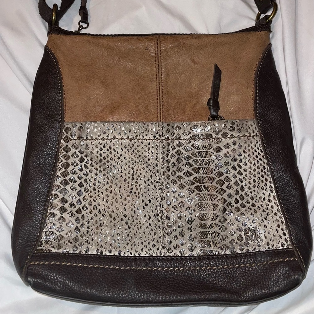 Unique limited edition Sak handbag with genuine textured leather print.